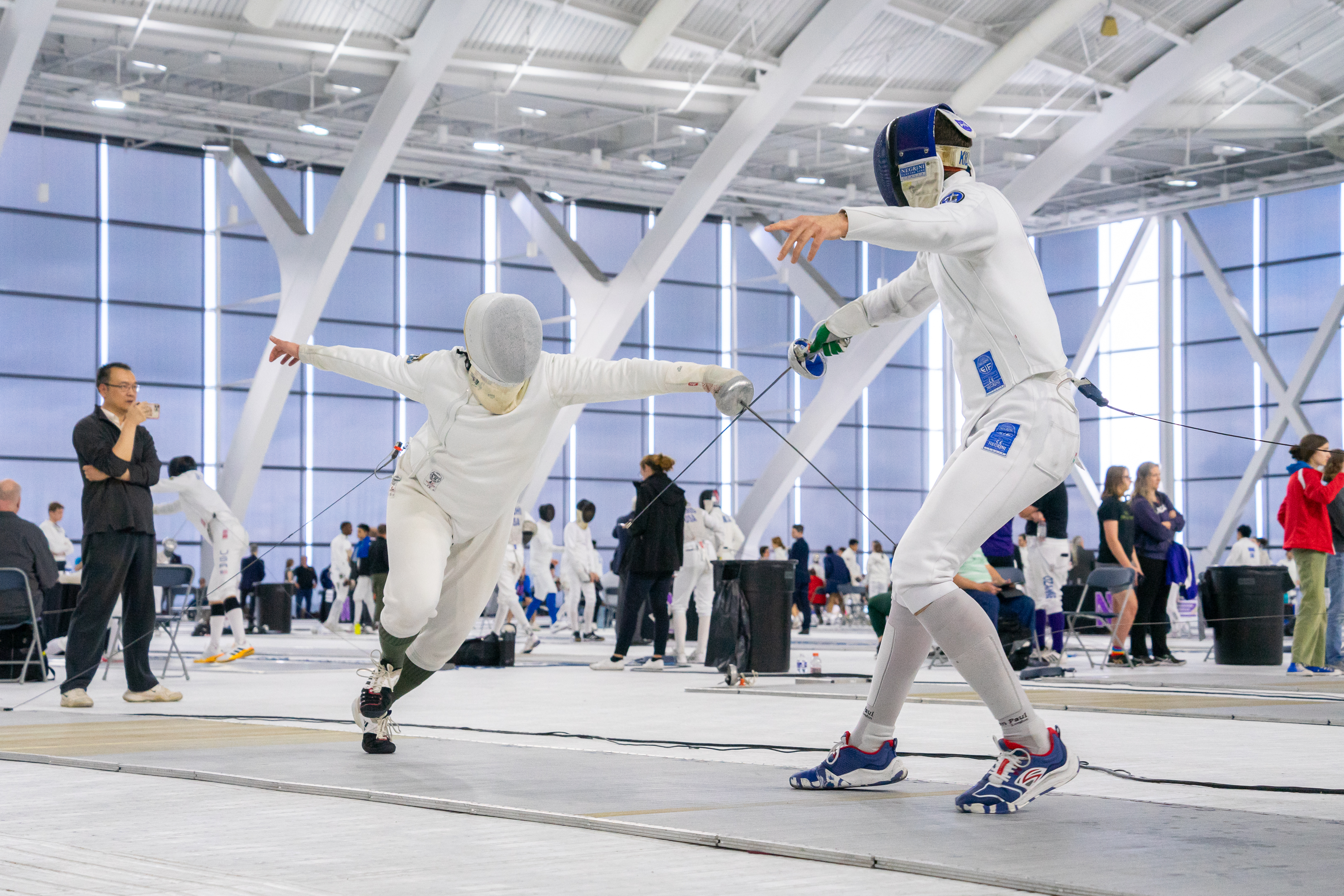 Epee fencer starts attack